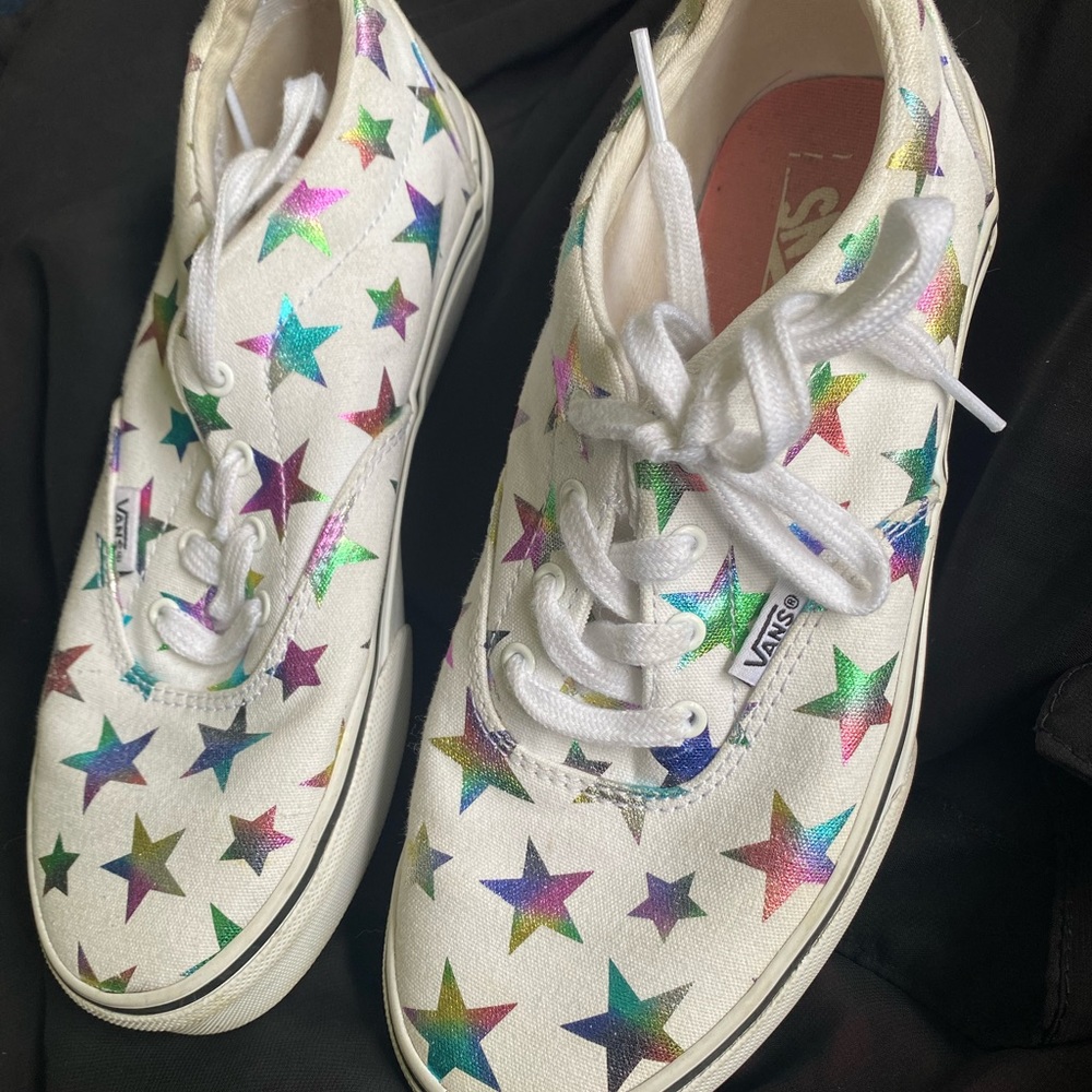 One pair of childs Van tennis shoes. Used but in excellent condition. Size 4.5